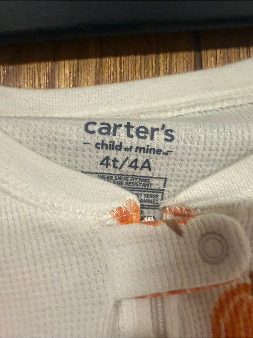 Carter's Cream Footed One-Piece with Orange Pumpkin Print
